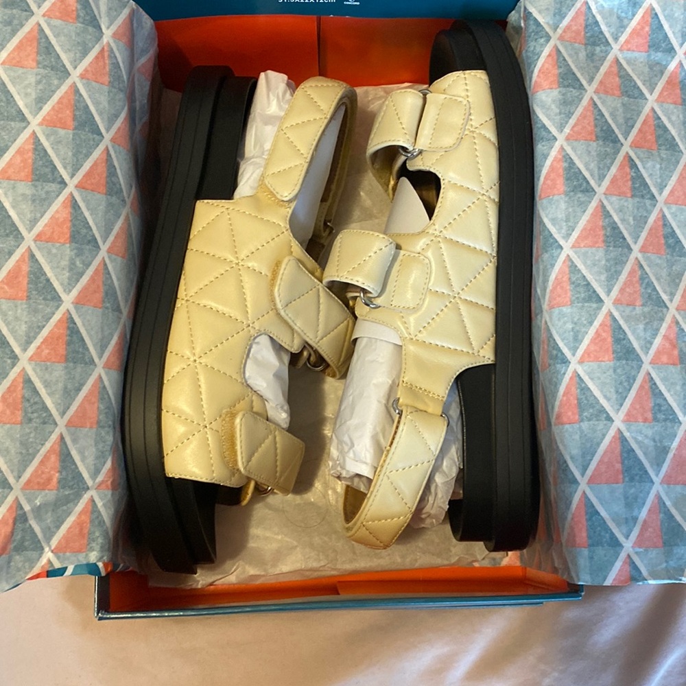 NWT never worn aerosols Lamirca sandals. Color: Bone Leather